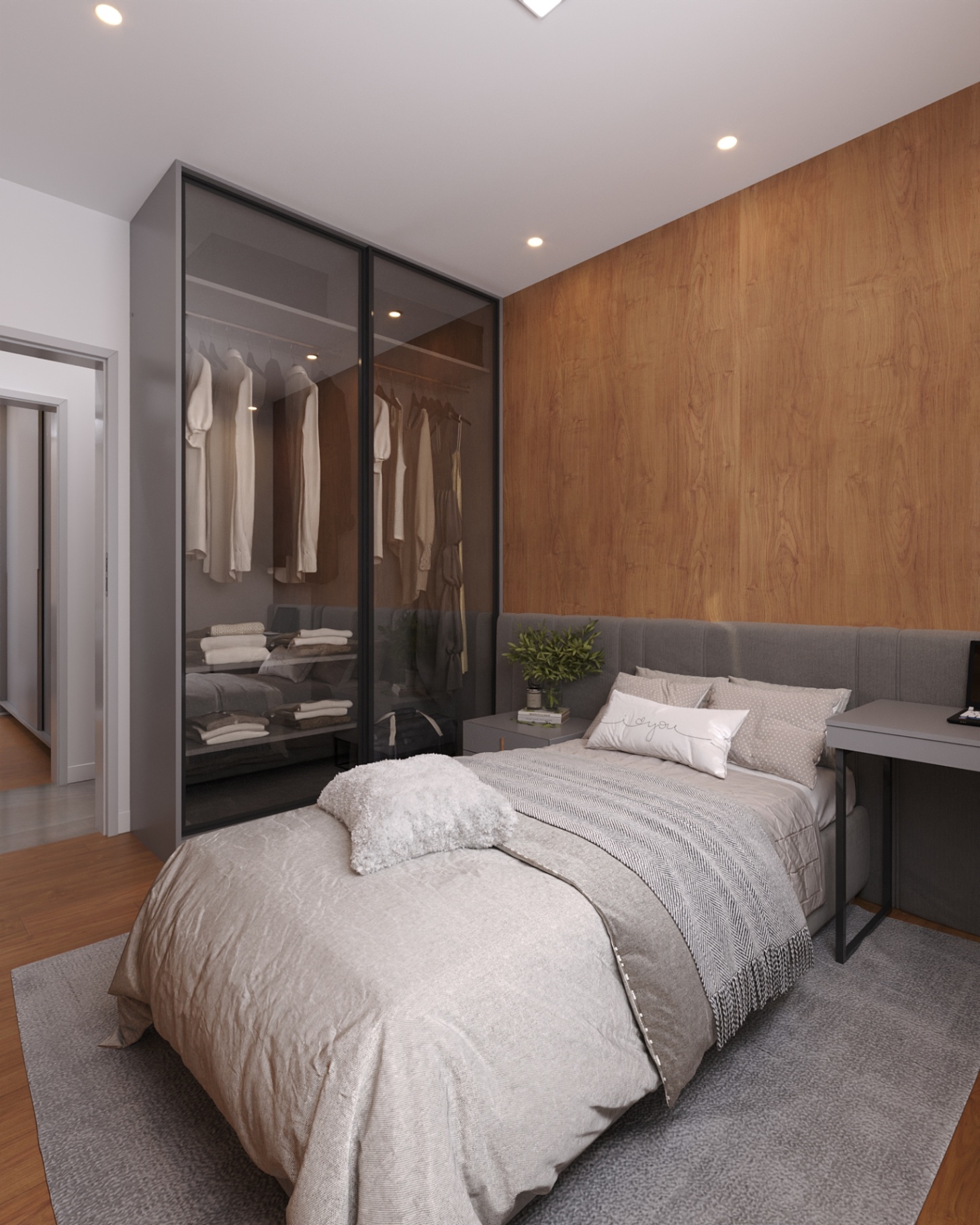 Segundo quarto com closet e bancada do apartamento tipo Joá