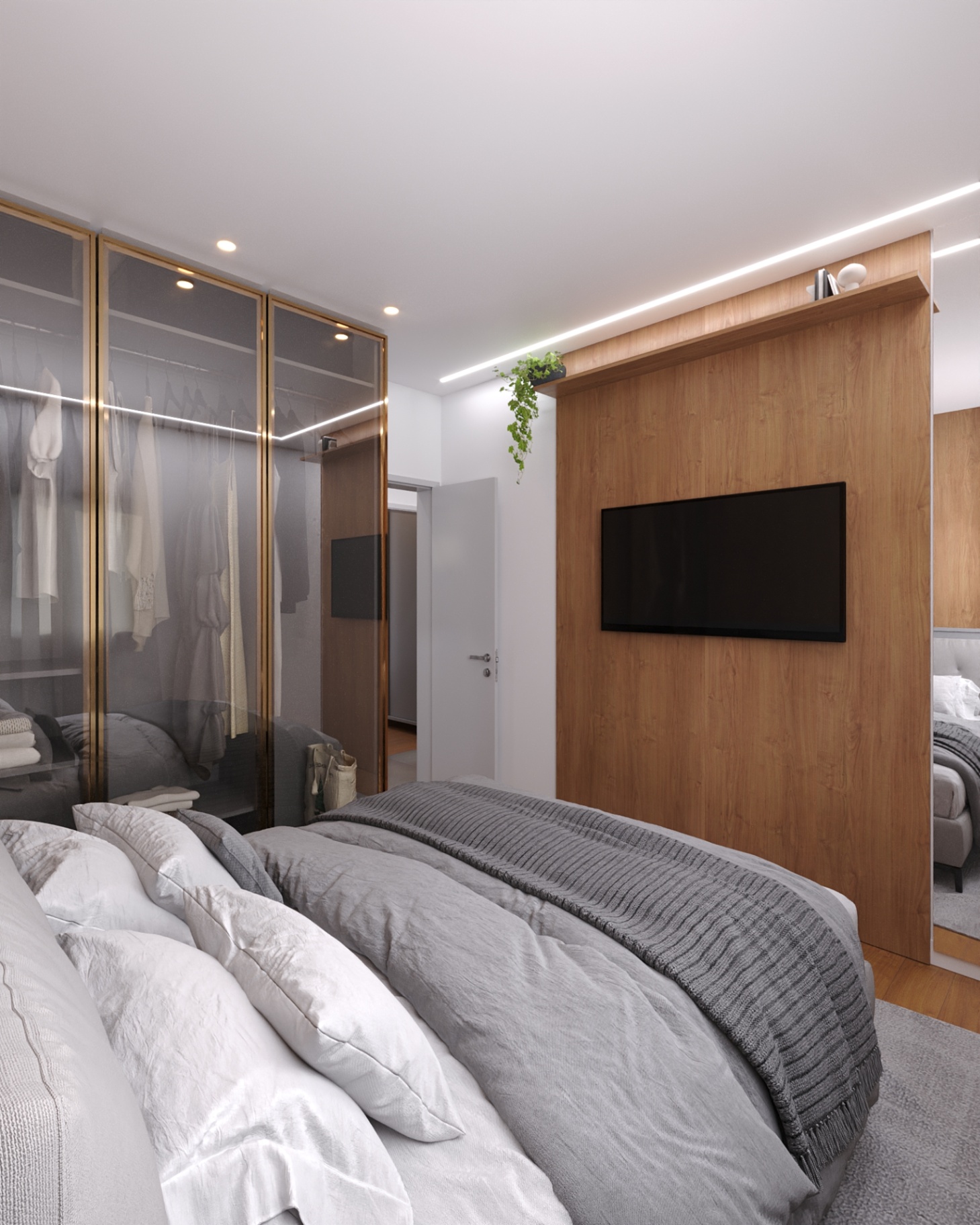 Vista da suíte com closet em vidro do apartamento tipo Joá