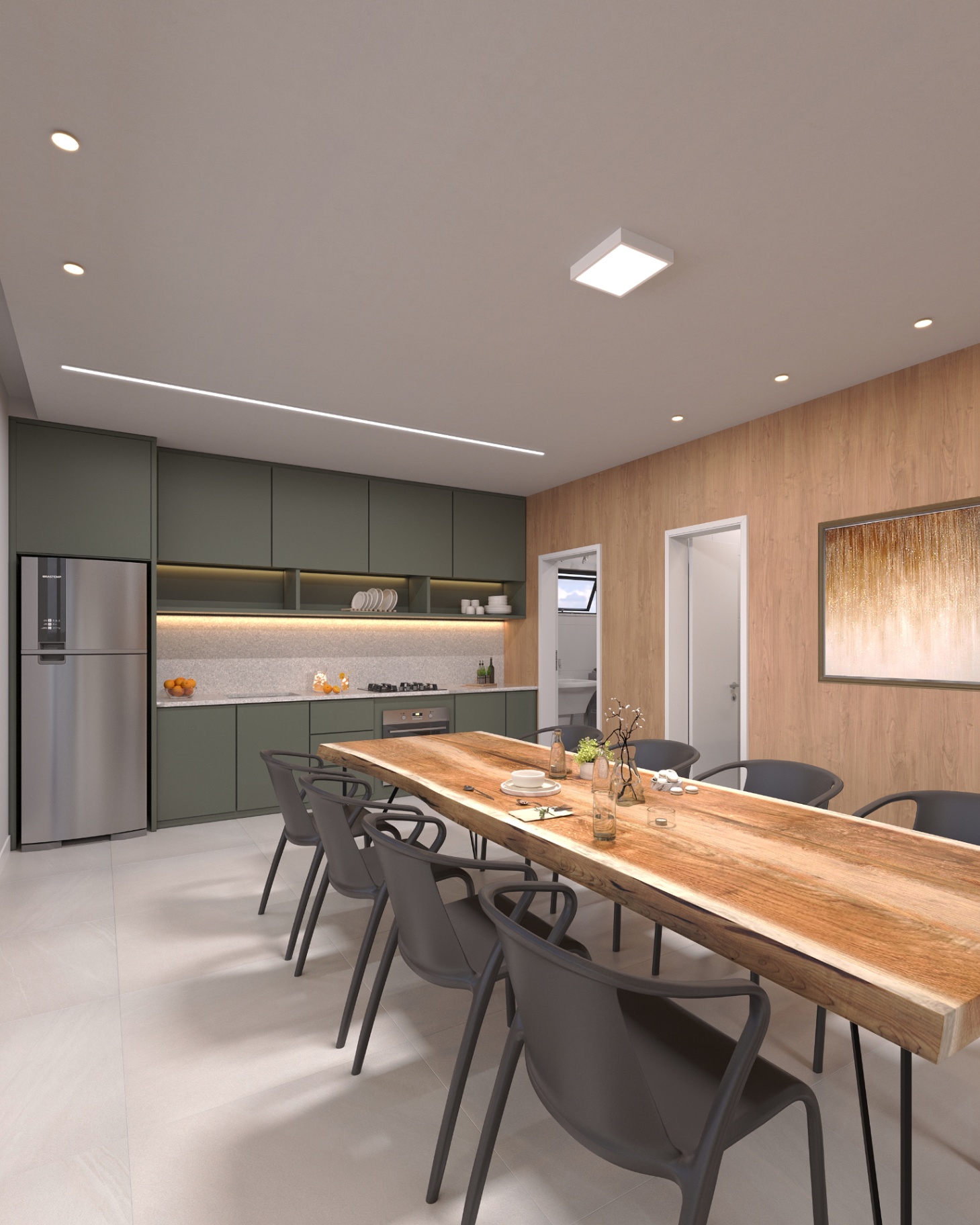 Cozinha da cobertura com marcenaria verde sage e mesa de jantar em madeira maciça