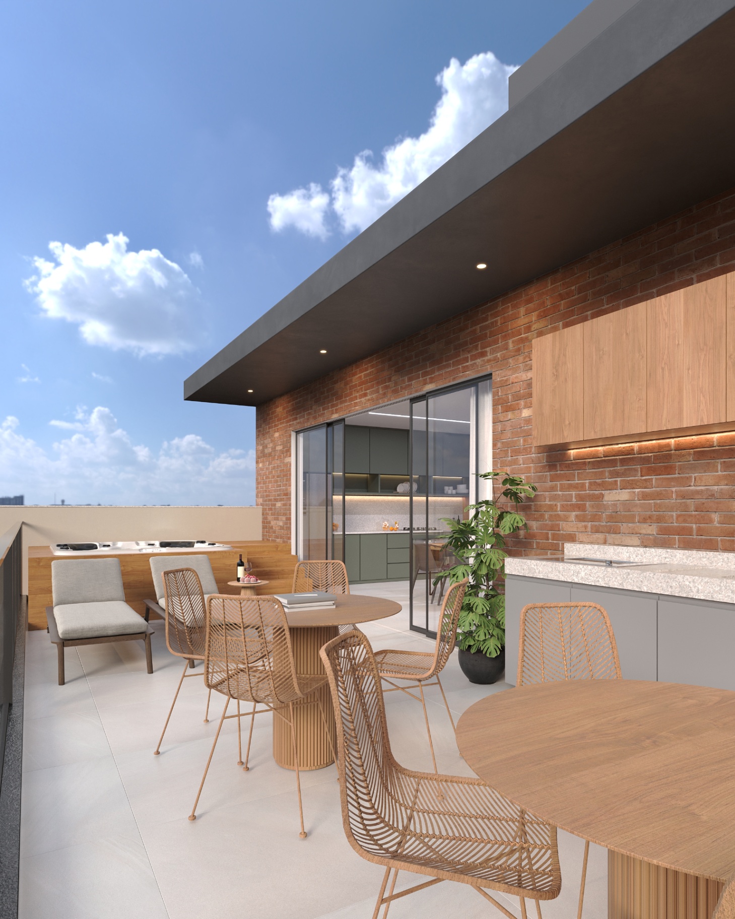 Terraço gourmet da cobertura com churrasqueira e estar externo